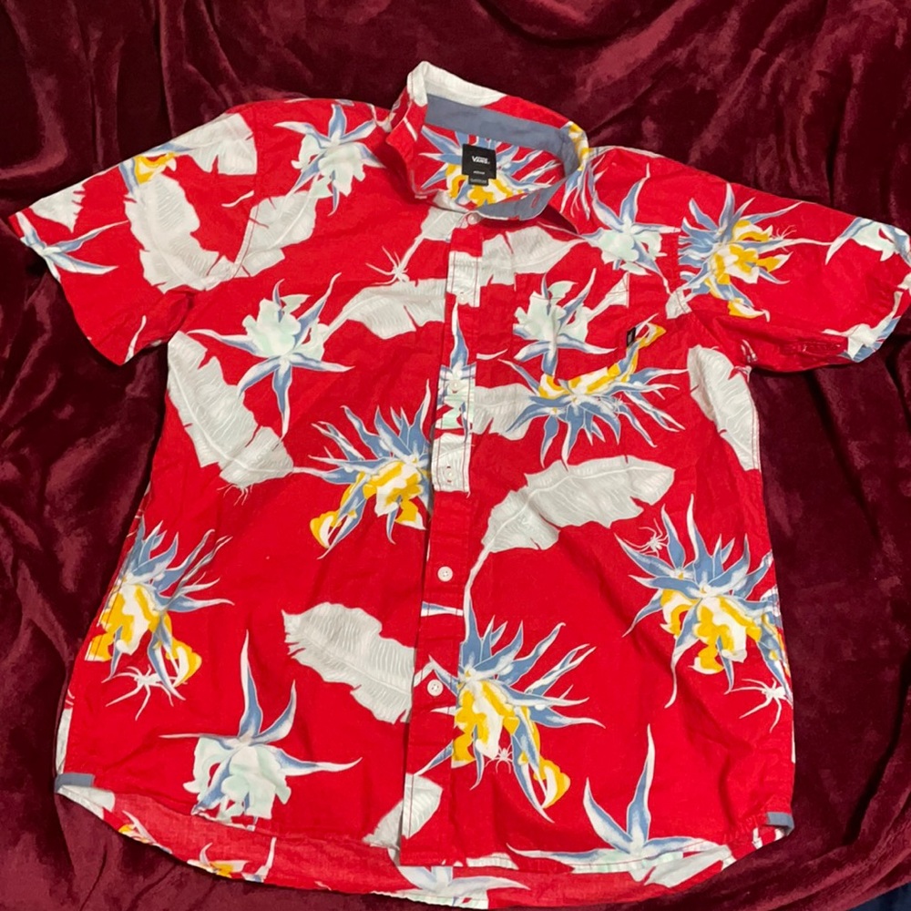 A red vans shirt that is for both genders.